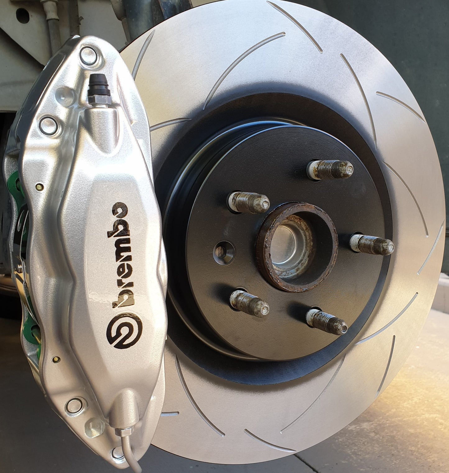 4 Pot front Brembo's painted in Silver w Black Brembo on Car